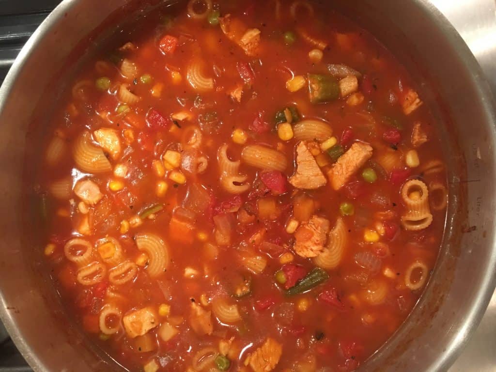 A pot of hearty chicken vegetable soup