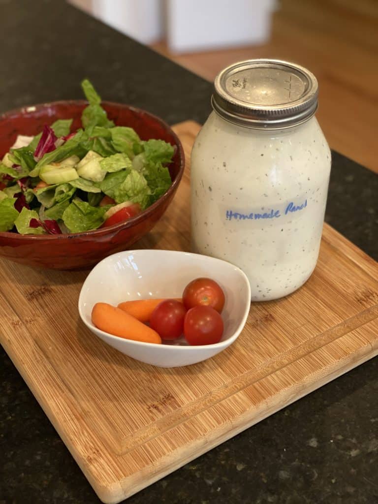 homemade ranch dressing with carrots and cherry tomatoes